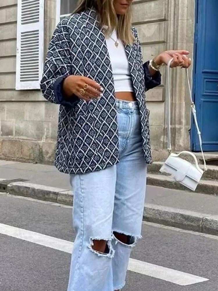 Tessy - Damquiltad jacka Lätt vadderad jacka med elegant geometriskt tryck, mitt upptill