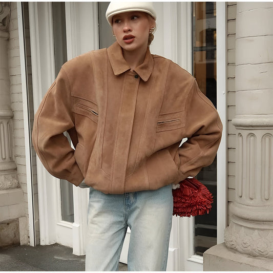 Isabella - Damkappa med konstnärlig design och elegant utseende